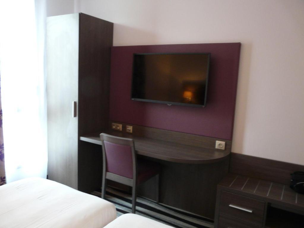 Kyriad Saint Quentin En Yvelines - Montigny Quarto foto